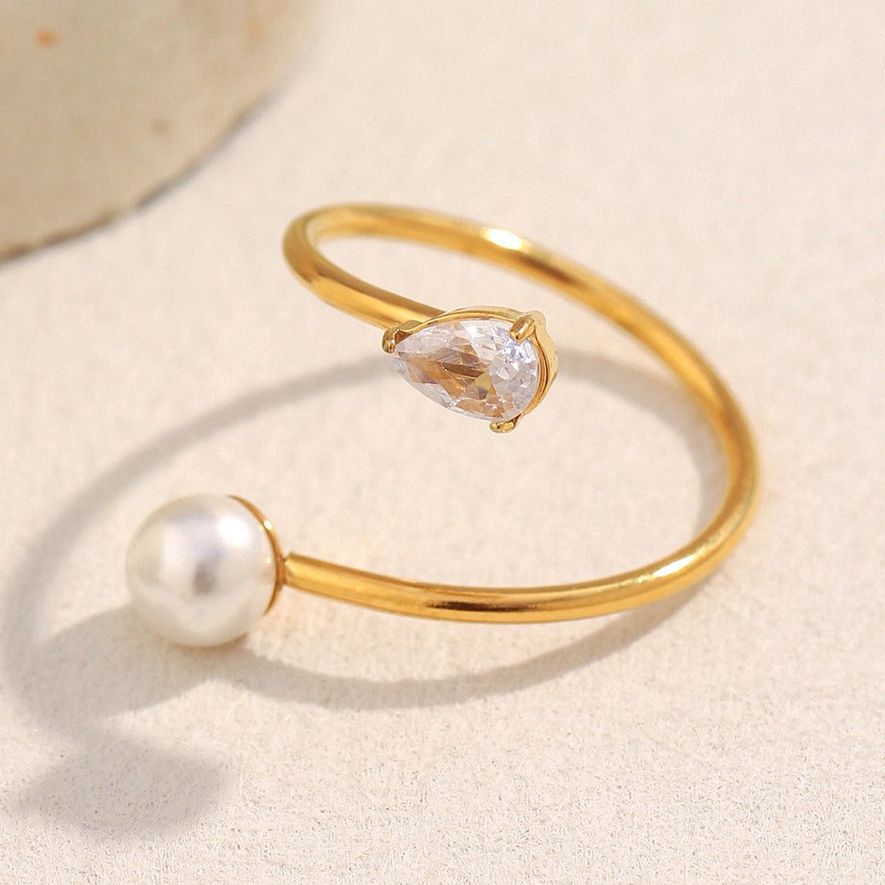 Minimalist Asymmetrical Snake Ring for Women in Stainless Steel with 18K Gold Plating Featuring Simulated Pearl and Zirconia Accents