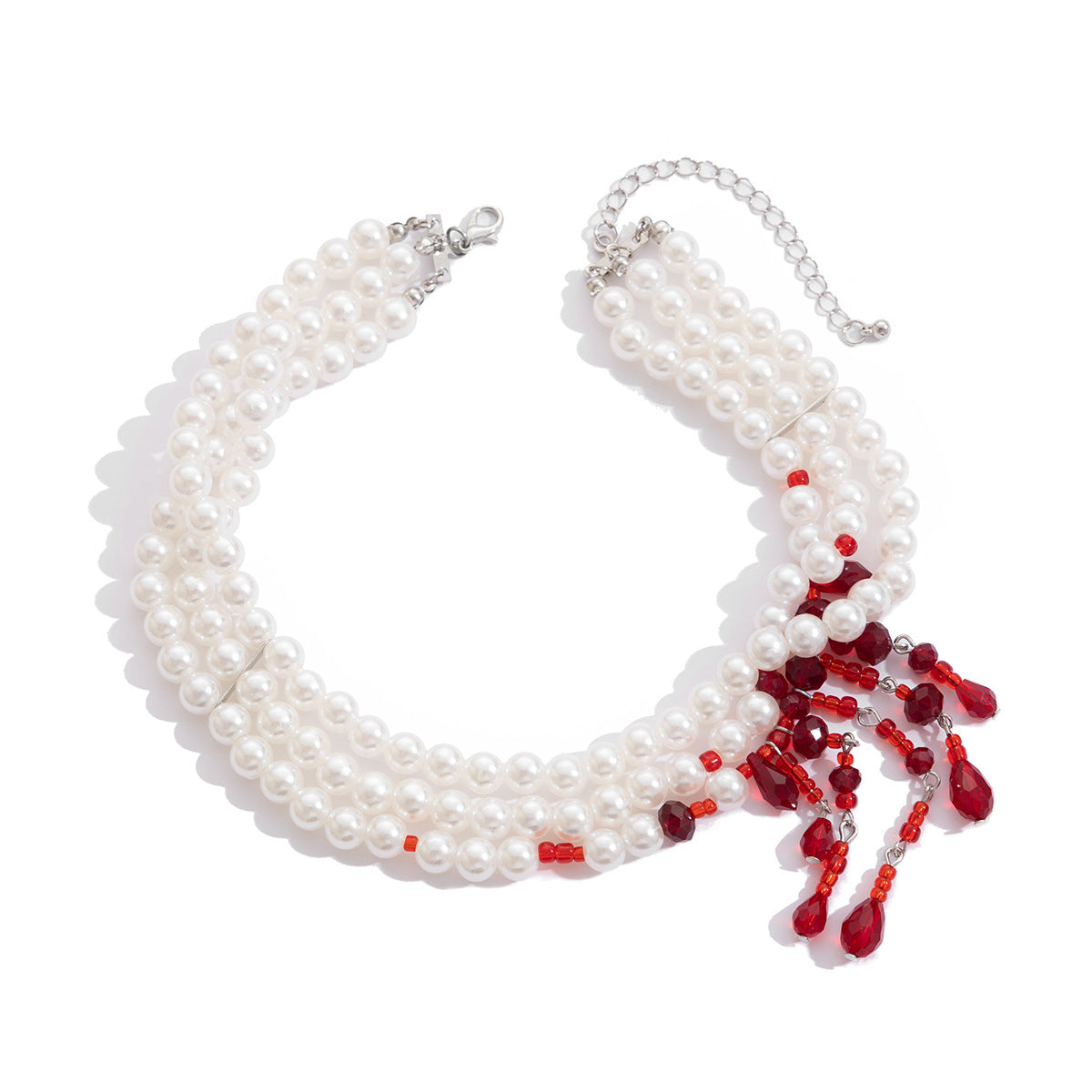 Collana con pendente a cuore e a goccia dolce e audace con perle imitation e strass, nappina e catena a sfere multistrato per donna