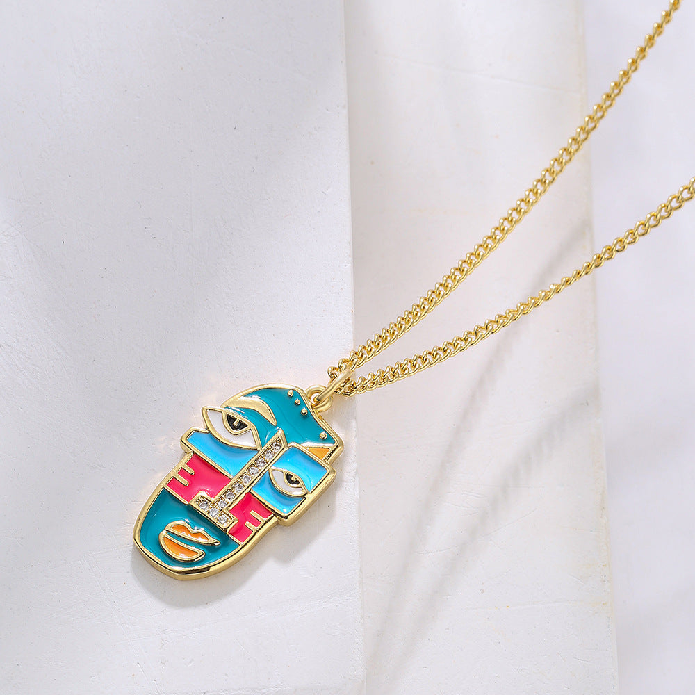 Abstract Face Pendant Necklace for Women in Copper with 18K Gold Plating Rhinestone Inlay and Enamel Finish