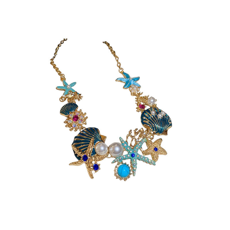 Elegante conjunto de collar con dije de coral, concha y estrella de mar con detalles de pedrería para mujer, estilo medallón minimalista, cadena delicada hasta la clavícula y pendientes de botón