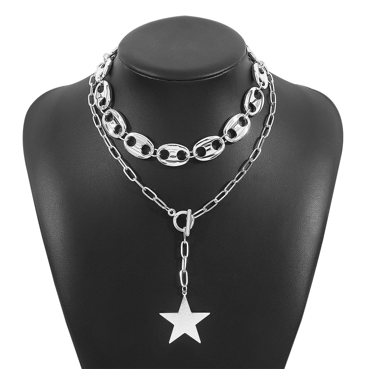 Collana con pendente geometrico minimalista a forma di stella da donna con catena in ferro galvanizzato e intarsio di strass