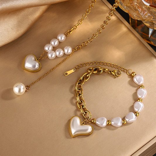 Juego de collar y pulsera de lujo con colgante de corazón de acero inoxidable bañado en oro de 18 quilates con perlas de resina para mujer