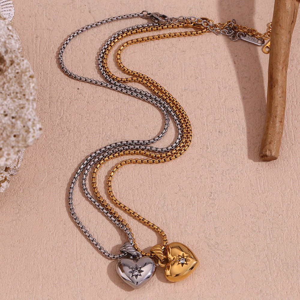 Collana con ciondolo a cuore in acciaio al titanio ispirata al vintage con placcatura in oro 18 carati e zirconi cubici per donna