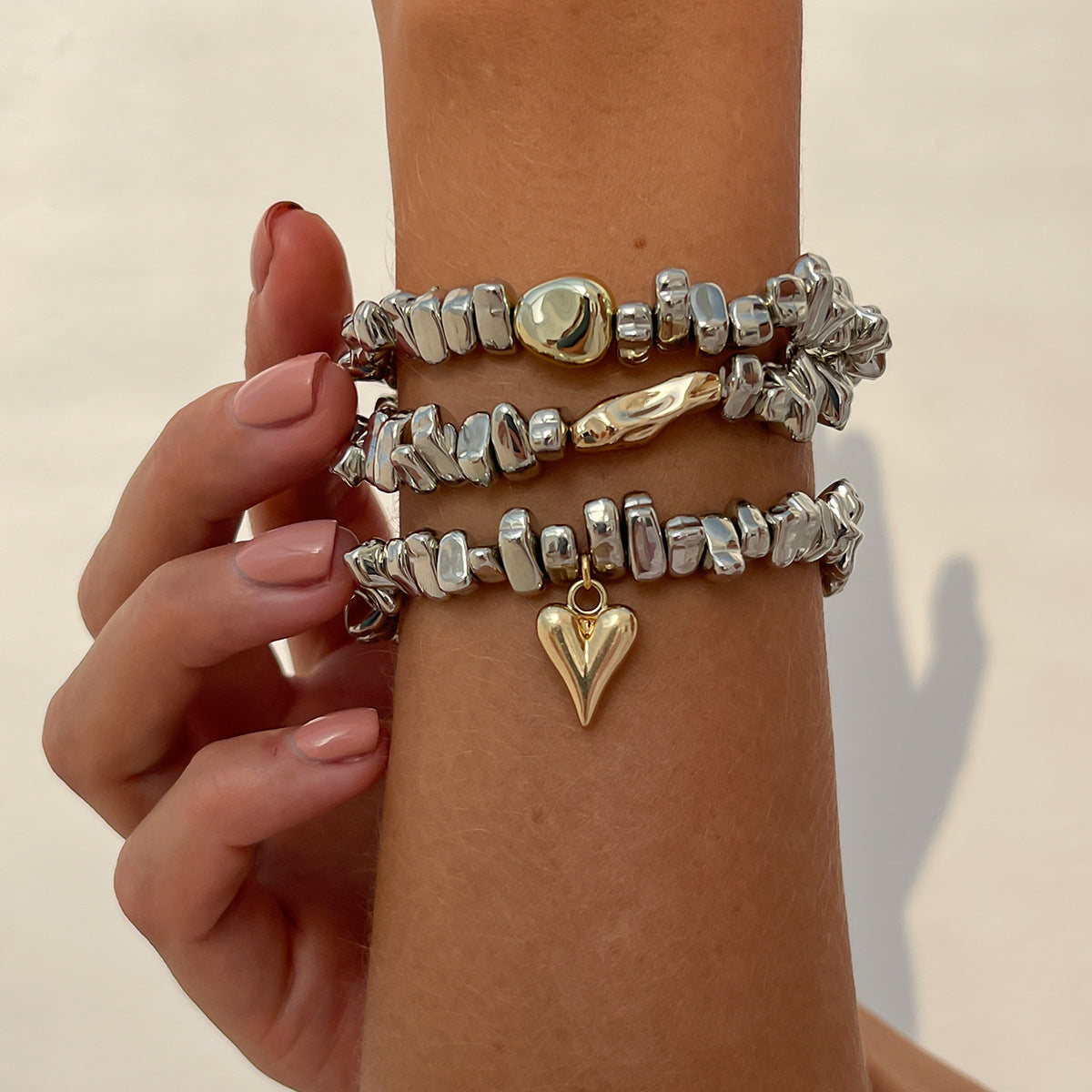Bracciale da donna con perline a forma di cuore geometrico individualistico e nappine