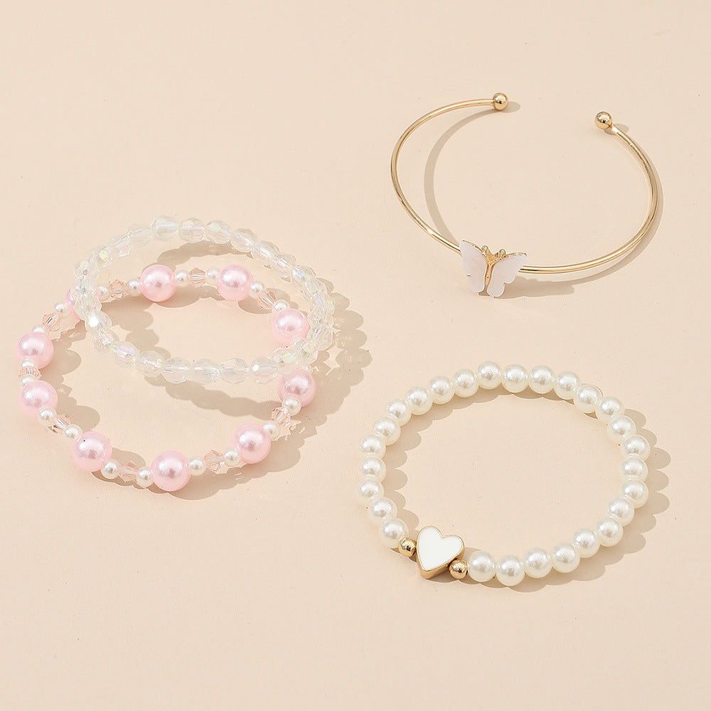 Juego de pulseras de aleación con forma de corazón y mariposa para niñas con detalles de perlas, pulsera de moda minimalista para niñas