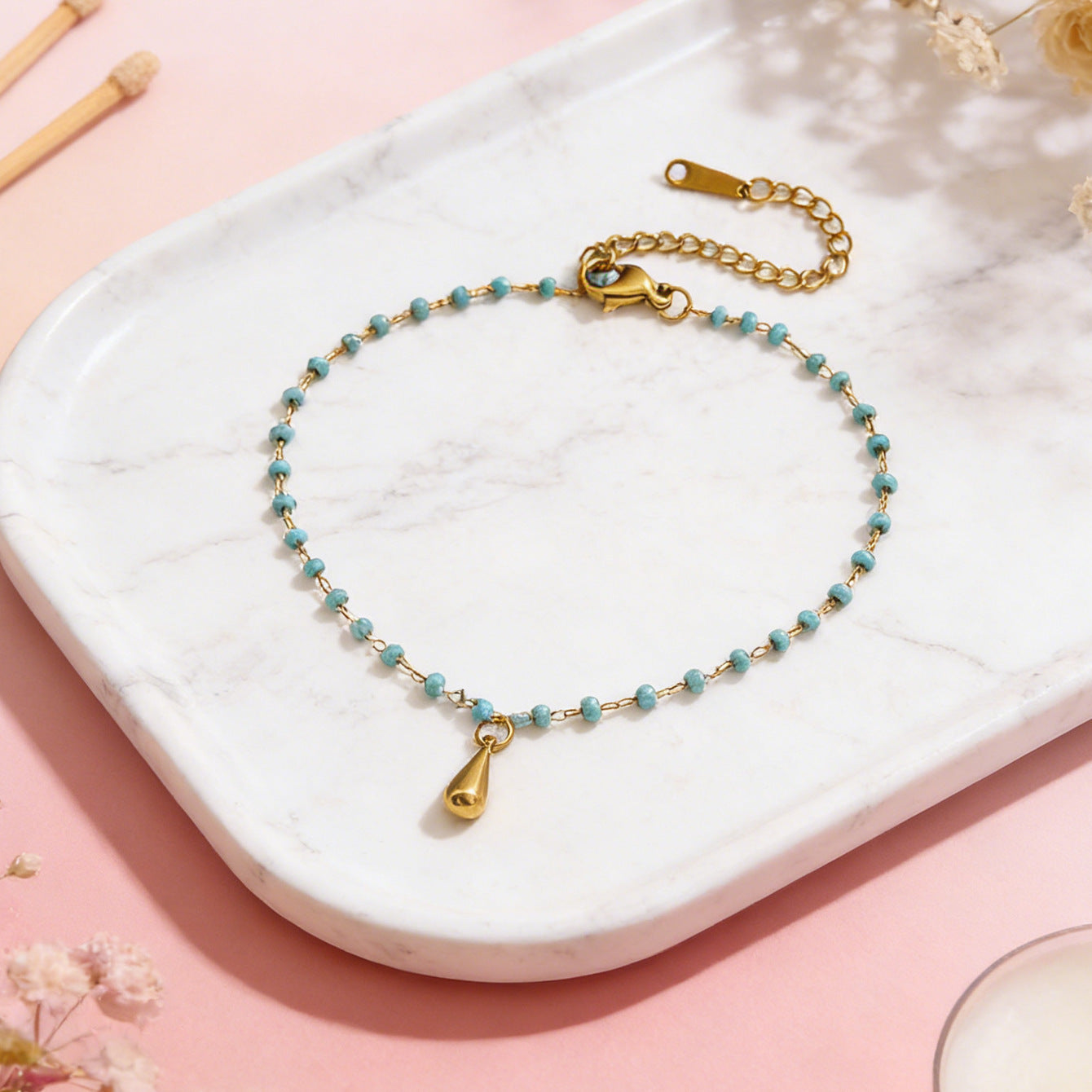 Cavigliera geometrica a goccia minimalista con perline in acciaio al titanio da donna