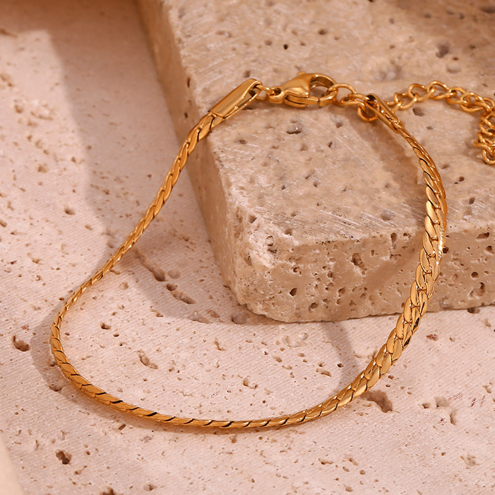 Pulsera de Acero Titanio Geométrica Minimalista para Mujer con Baño de Oro de 18K y Cadena NK Pulida