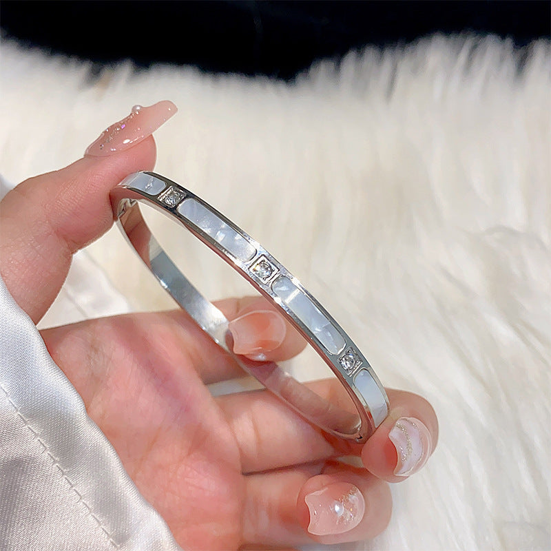 Minimalist Elliptical Titanium Steel Bracelet with Plating Finish for Women Elegant Lightweight Luxury Bangle