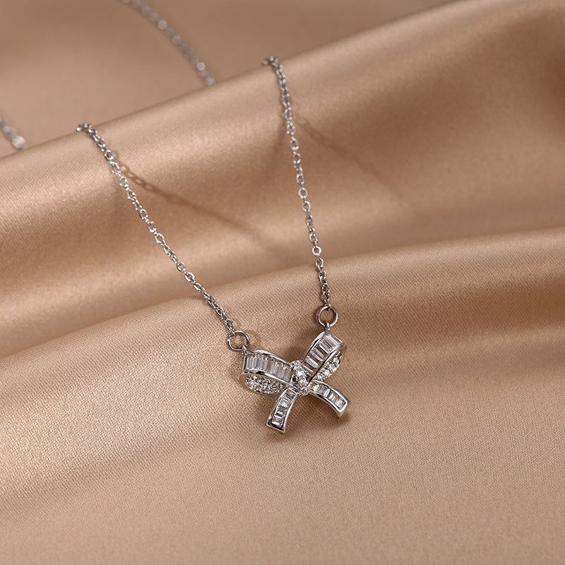 Minimalist Bow-Shaped Titanium Steel Plated Clavicle Necklace with Micro-Pave Zirconia for Women and Men