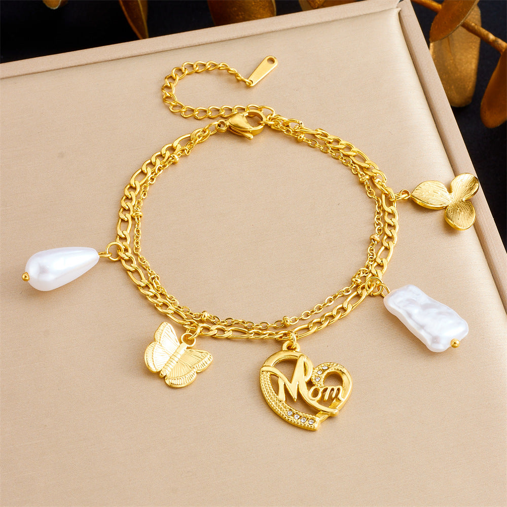 Bracciale con ciondolo floreale e a cuore in stile vintage in acciaio inossidabile con finitura placcata da donna