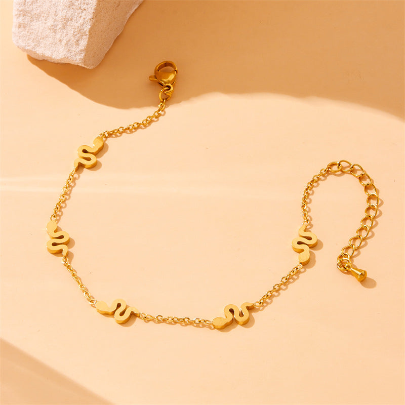 Set di Collana, Orecchini e Bracciale con Ciondolo a Serpente Minimalista in Acciaio Inossidabile Placcato