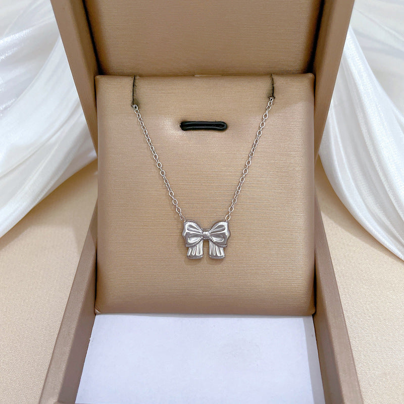 Minimalist Butterfly Knot Titanium Steel Necklace for Women with Gold Plating and Geometric Design Locket Chain