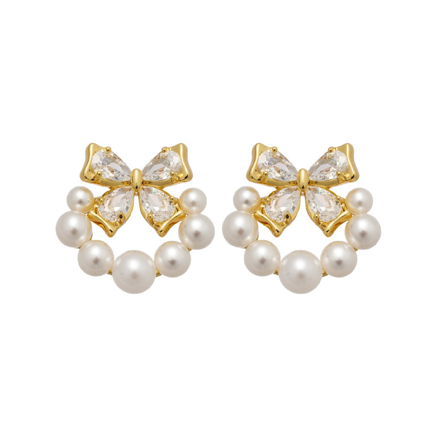 Elegantes pendientes de perlas simuladas en forma de lazo con incrustaciones de circonitas para mujer, joyería de moda minimalista de lujo para uso diario