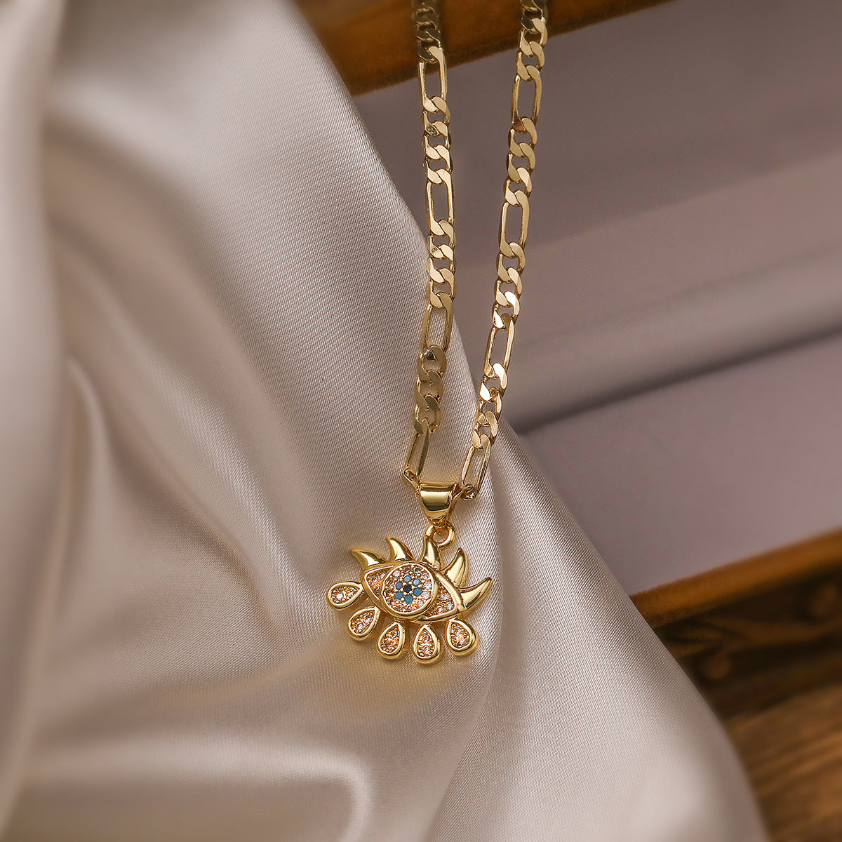 Parure minimalist con collana e orecchini malocchio in rame con zirconi e catenina a sfere