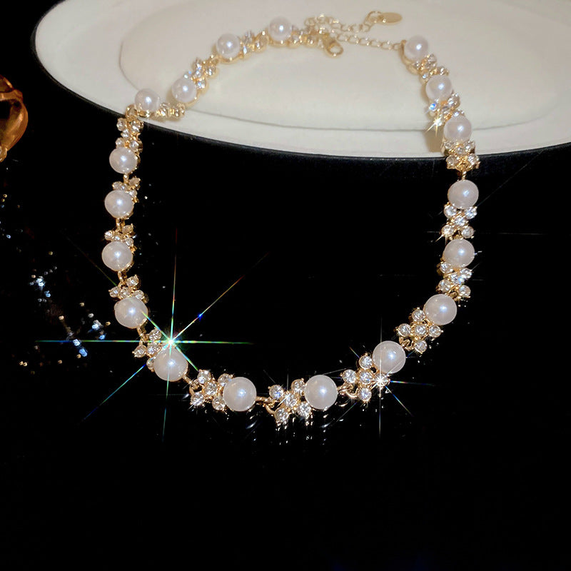 Elegante juego de collar redondo de perlas florales con incrustaciones de circonita para mujer, incluye pendientes, pulsera y cadena de clavícula