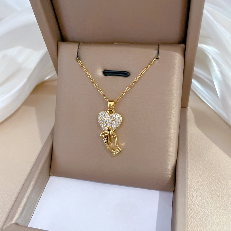 Collar minimalista de acero de titanio con forma de corazón coreano y circonitas incrustadas para mujer y hombre, cadena delicada para la clavícula
