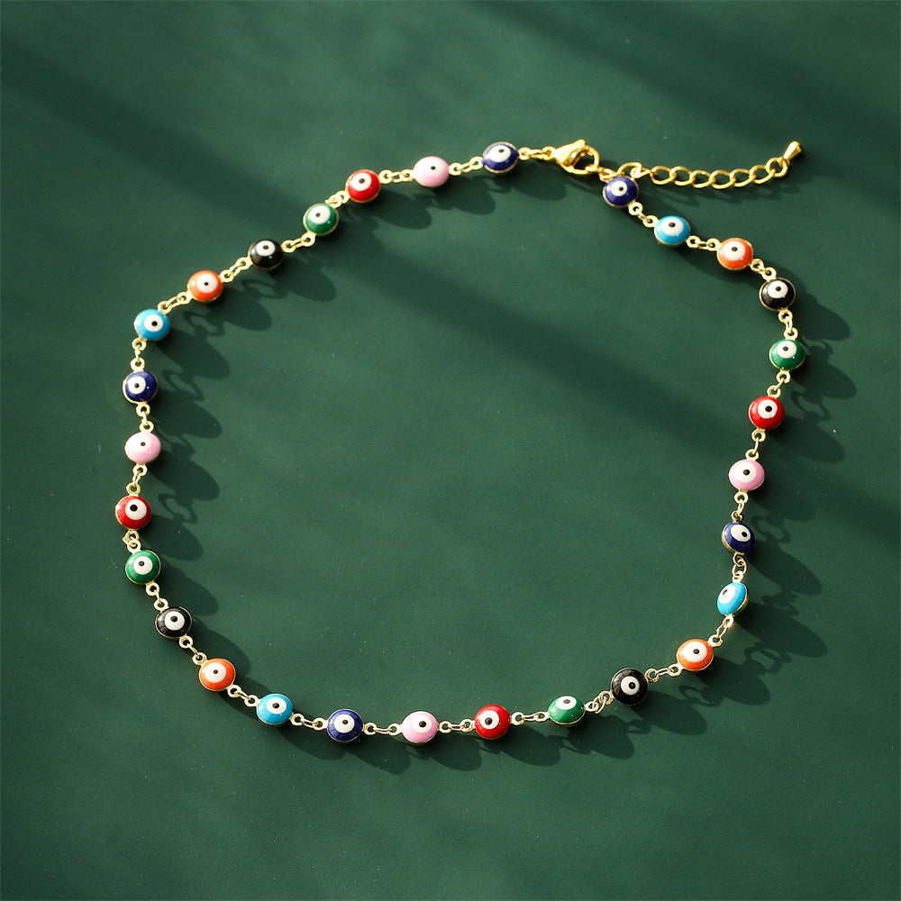 Collana pendente a occhio di Allah geometrico minimalista in rame placcato oro e finitura smaltata da donna