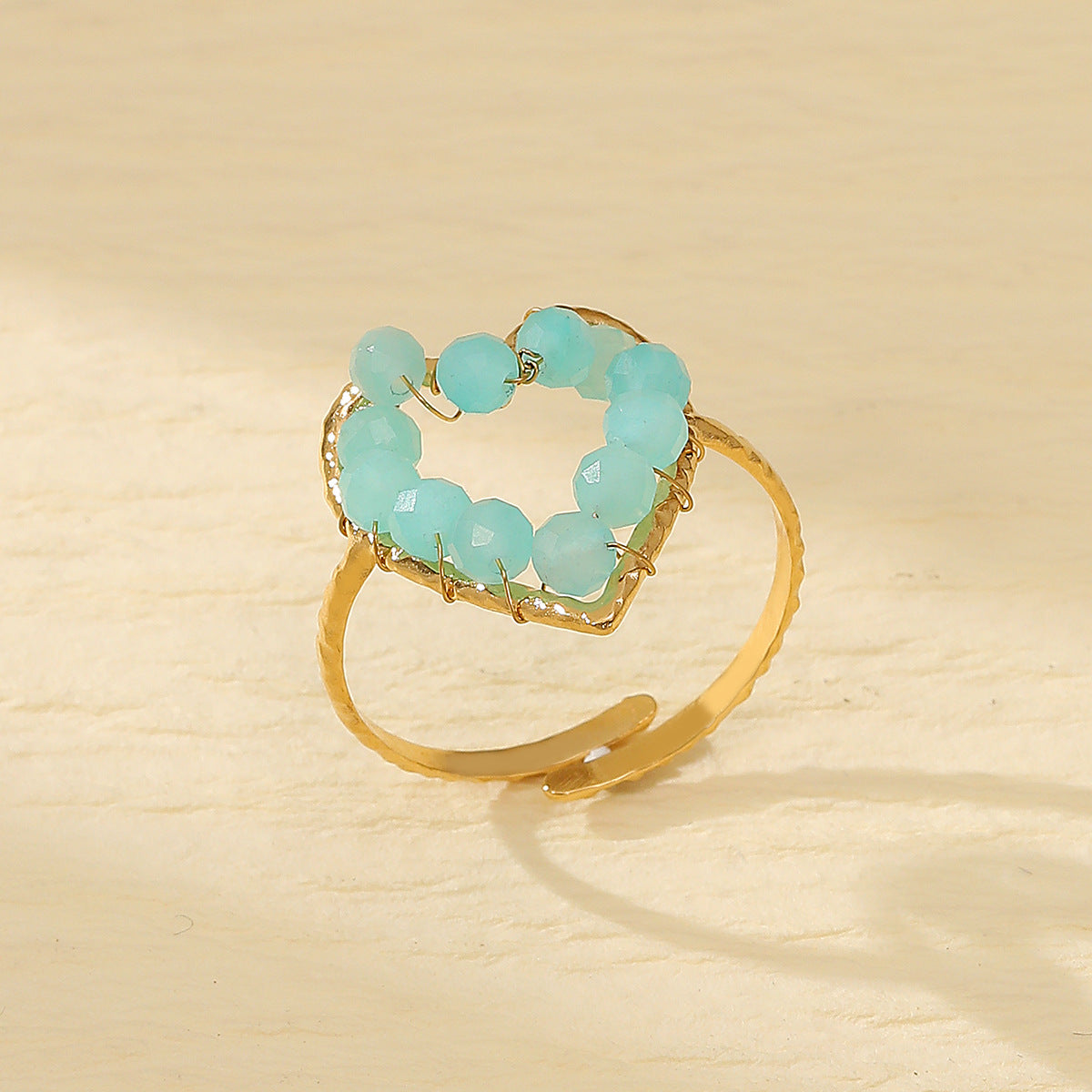 Anello in acciaio al titanio a forma di cuore con finitura galvanizzata e pietra naturale, stile lusso leggero, da donna