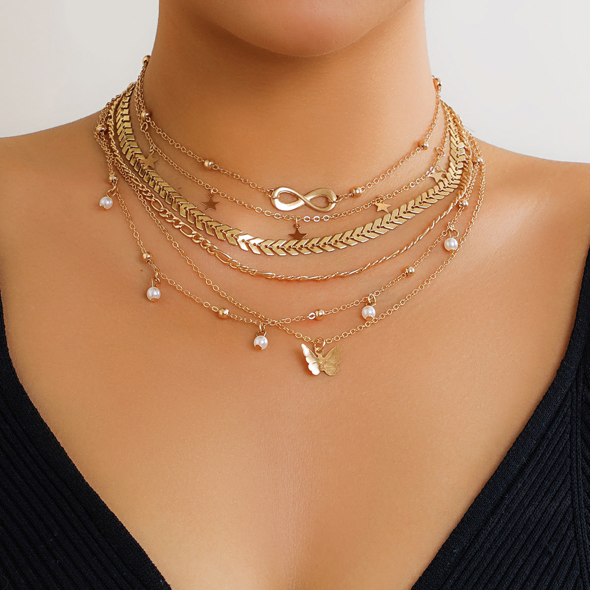 Boho Butterfly Pendant Necklace Set with Heart Star Geometric Charms Alloy Chain Tassel Detail
