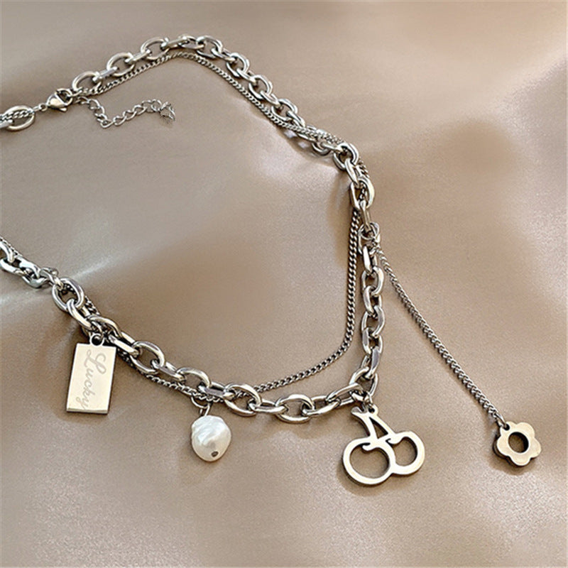 Collana con Ciondolo a Fiore di Ciliegio Minimalista da Donna e Uomo con Catena a Serpente a Doppio Strato in Acciaio al Titanio e Finitura Lucida
