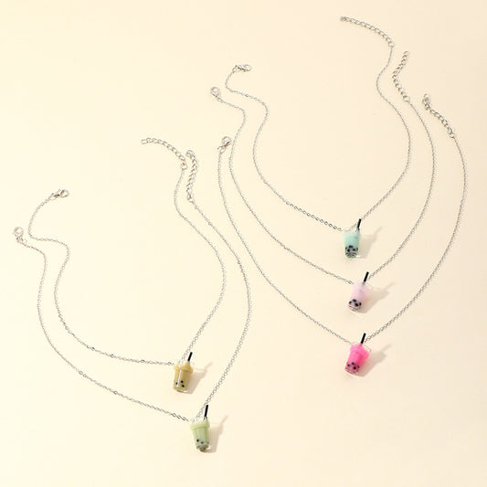 Collar colgante de té con leche de dibujos animados para niños con dije de resina y diseño de cadena de serpiente