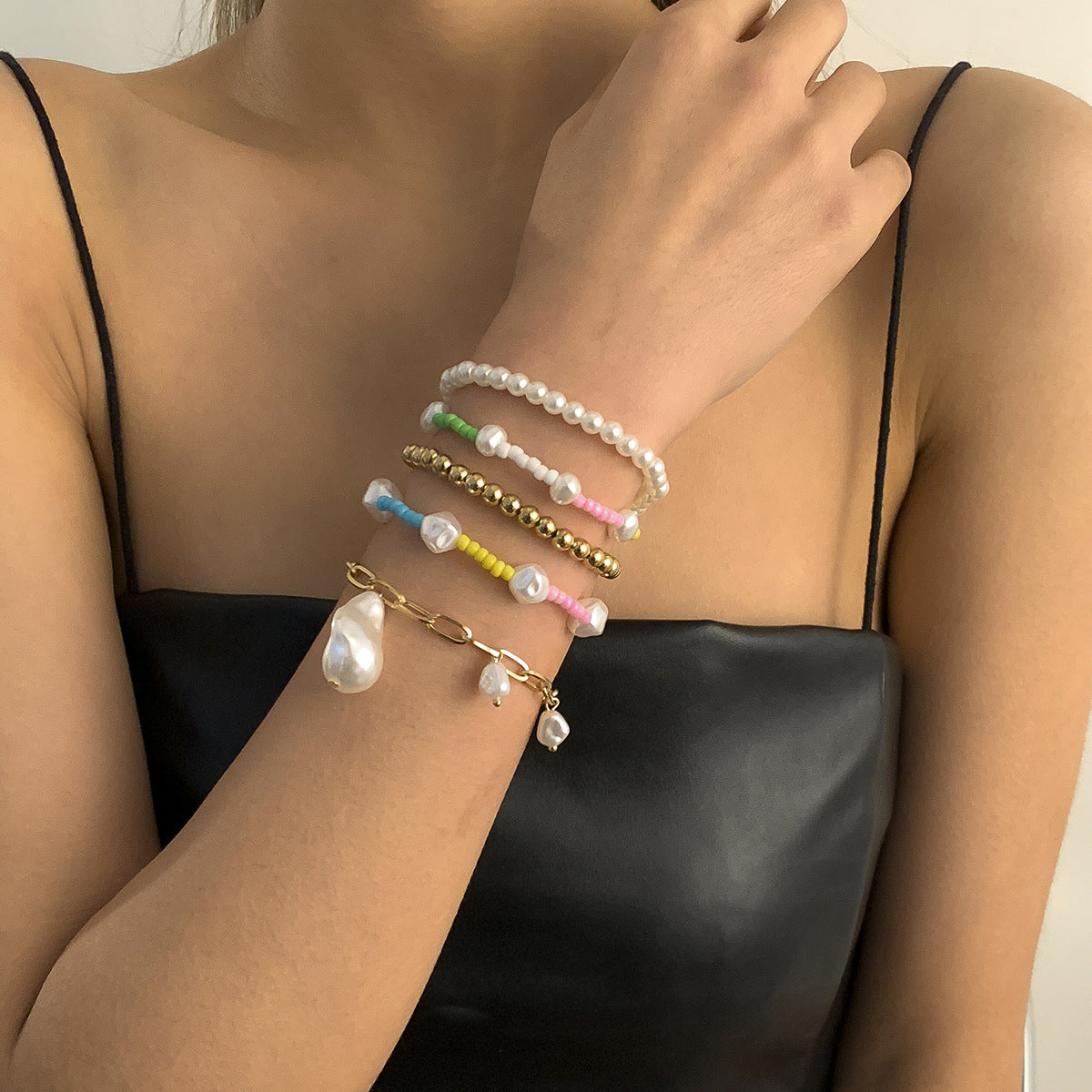 Minimalist Ethnic Geometric Imitation Pearl Bracelet for Women with Metal Chain and Tassel Details