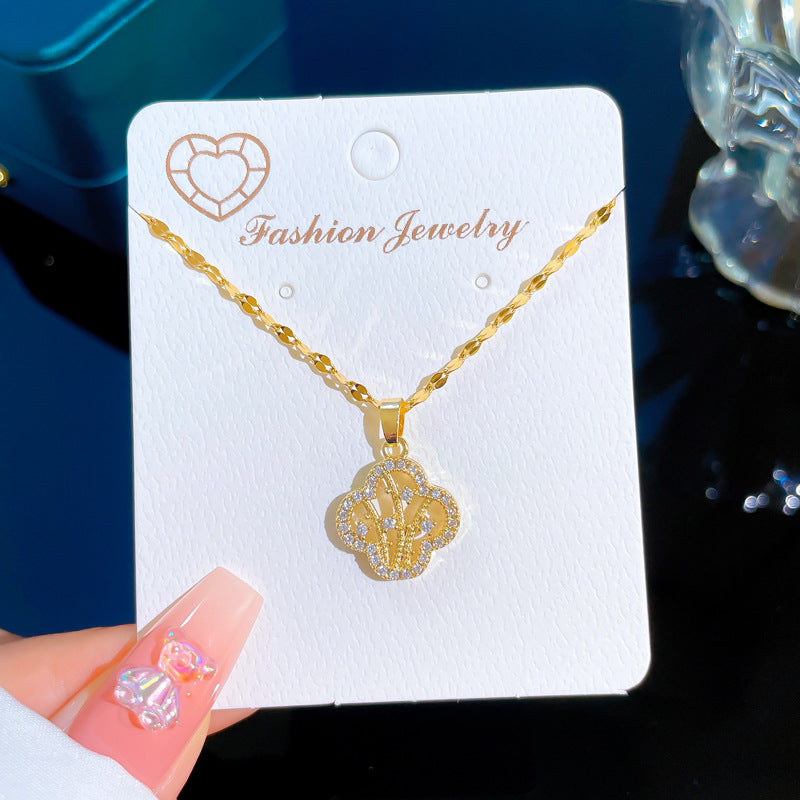 Collana da donna in acciaio al titanio di lusso leggero con pendente a quadrifoglio, intarsio di strass completo e design geometrico per lo styling della clavicola