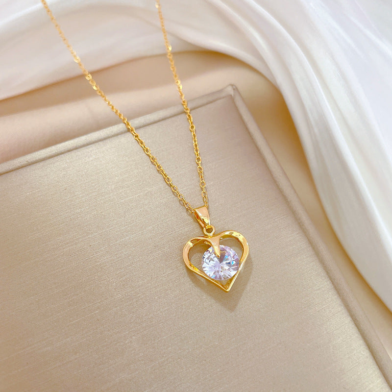 Collana con ciondolo a cuore in zircone in acciaio al titanio di lusso unisex