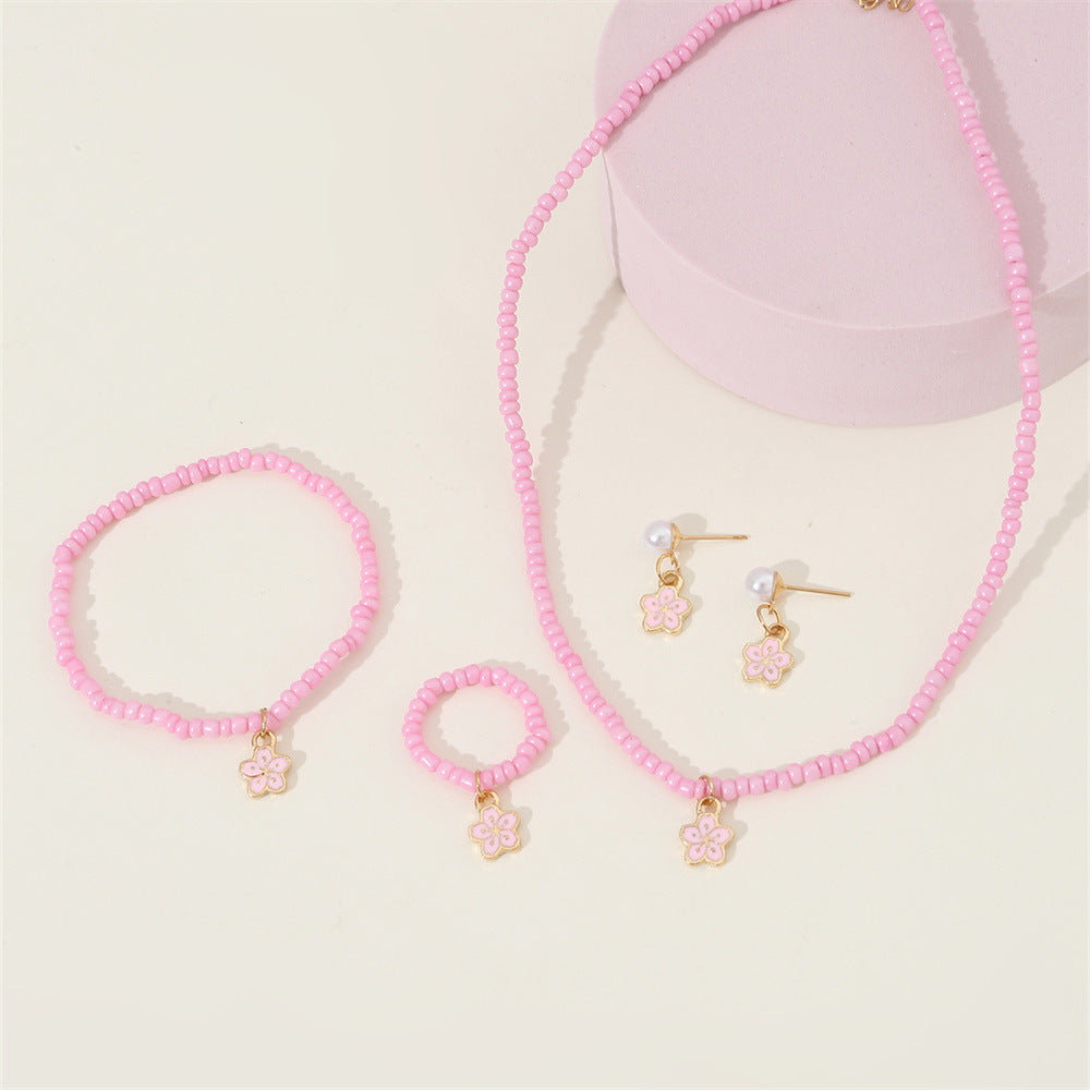Set di collana con perline di vetro floreali minimaliste carine con bracciale anello e orecchini abbinati per bambini
