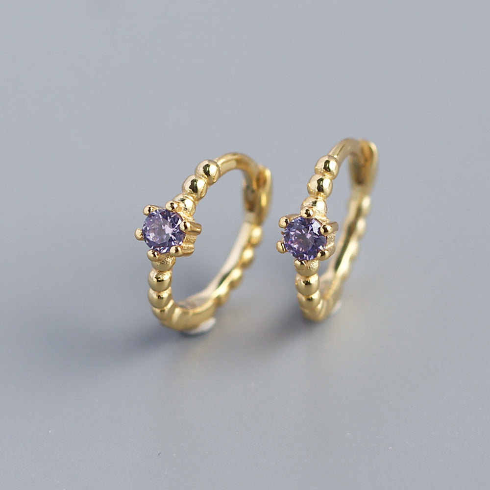 Orecchini a perno tondi con intarsi di diamanti in argento sterling 925