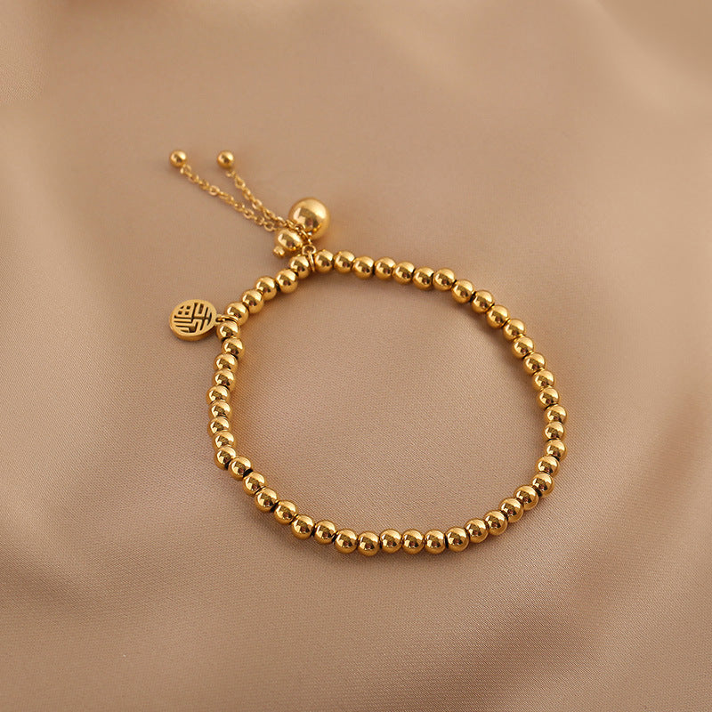 Chinese New Year Lucky Fu Character Solid Mini Gourd Bracelet for Women in Titanium Steel with 18K Gold Plating