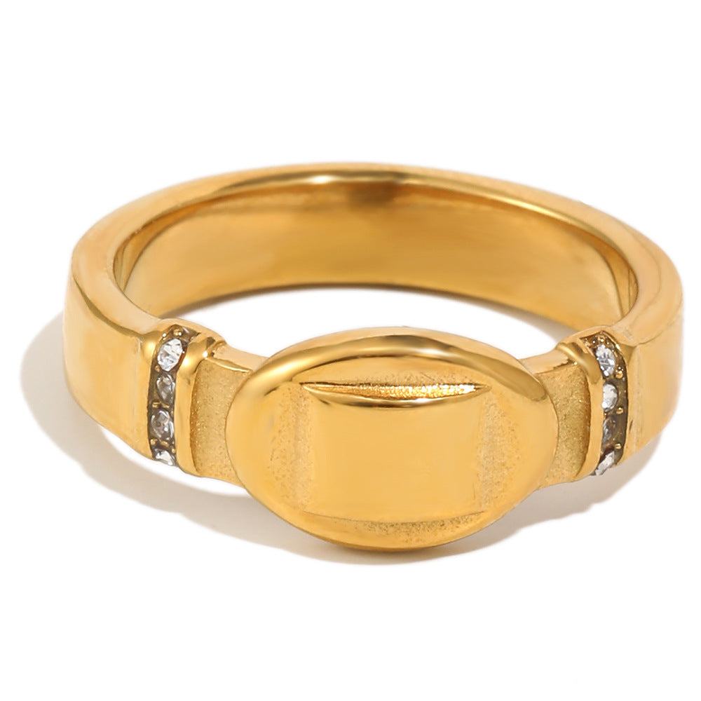 Elegante anillo ovalado de acero inoxidable con baño de oro de 18 quilates y diamantes de imitación para mujer