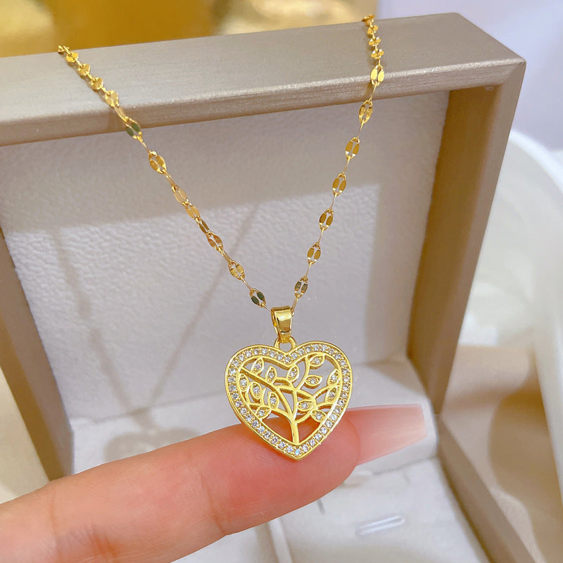 Luxury Titanium Steel Heart-Shaped Leaf Pendant Necklace for Women, Delicate Clavicle Chain with Plated Finish, Natural Theme Wedding and Party Jewelry