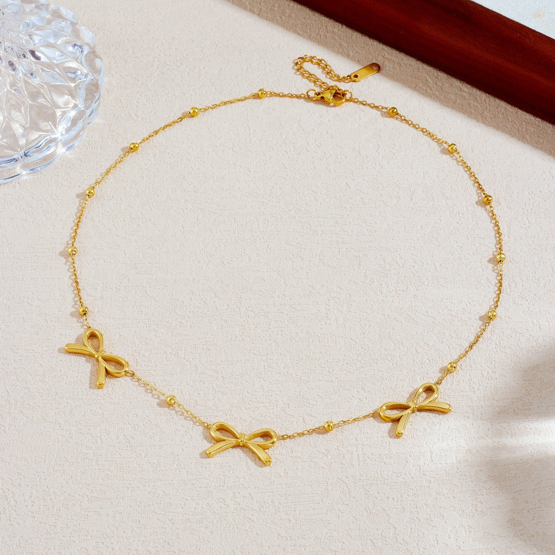 Gold Plated Hollow Bow Knot Stainless Steel Ball Chain Necklace for Women