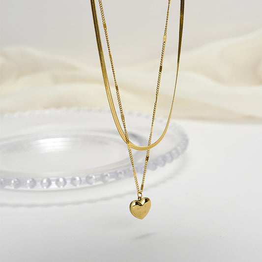 Collar de lujo de acero de titanio de doble capa con colgante de corazón para mujer con cadena de serpiente y diseño de amor estereoscópico