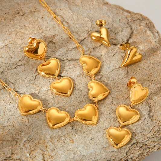 Juego de pendientes y collar minimalista de acero de titanio con forma de corazón para mujer con acabado galvanizado y cadena cruzada
