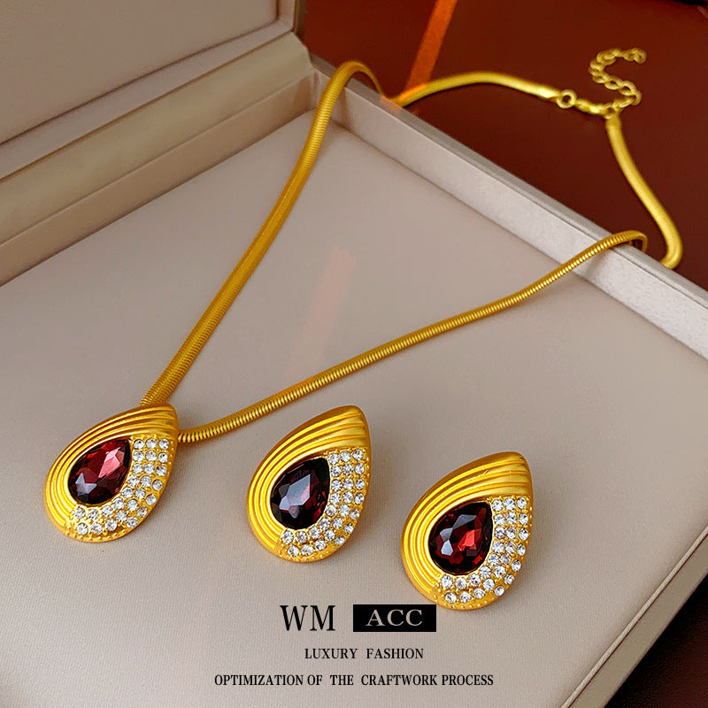 Pendientes de aleación con forma de gota geométrica de estilo vintage, incrustaciones de pedrería y baño de oro para mujer