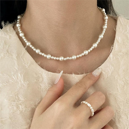 Tobillera minimalista de plata de ley 925 con forma de estrella y detalle de perla