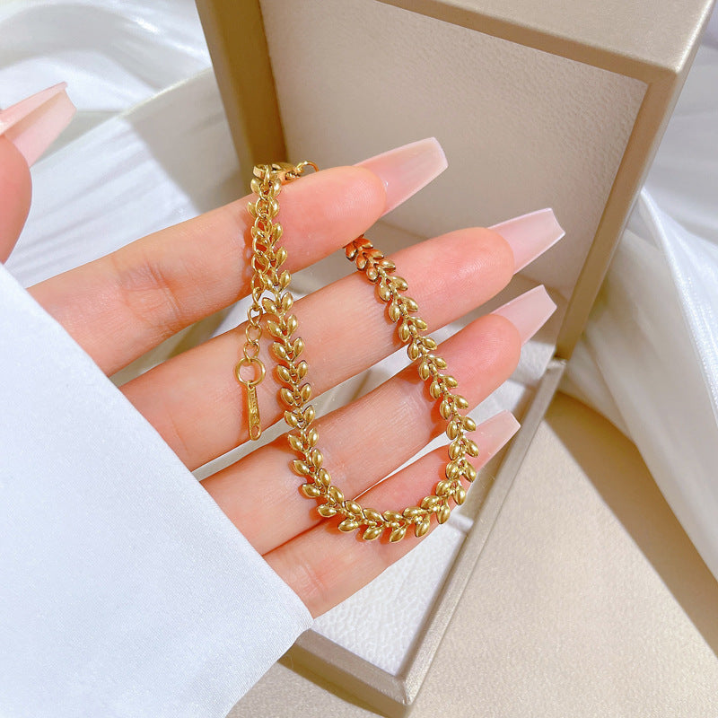 Minimalist Titanium Steel Wheat Ear Chain Bracelet for Women with Gold Plating and Wavy Texture Design