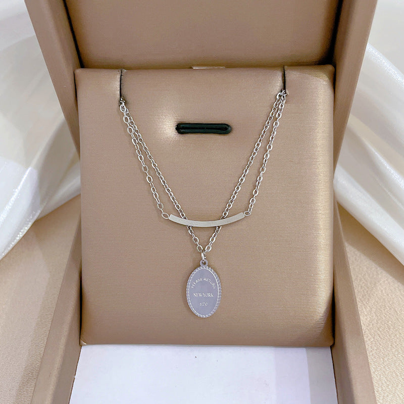 Collar con colgante redondo de doble capa, geométrico y minimalista para mujer, de acero de titanio con chapado en oro, cadena de medallón, accesorio de moda