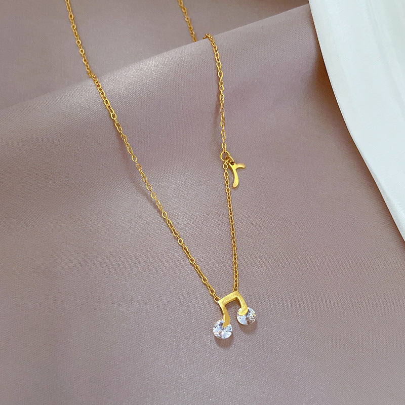Minimalist Music Note Pendant Necklace for Women and Men in Titanium Steel with Gold Plating and Floral Motif