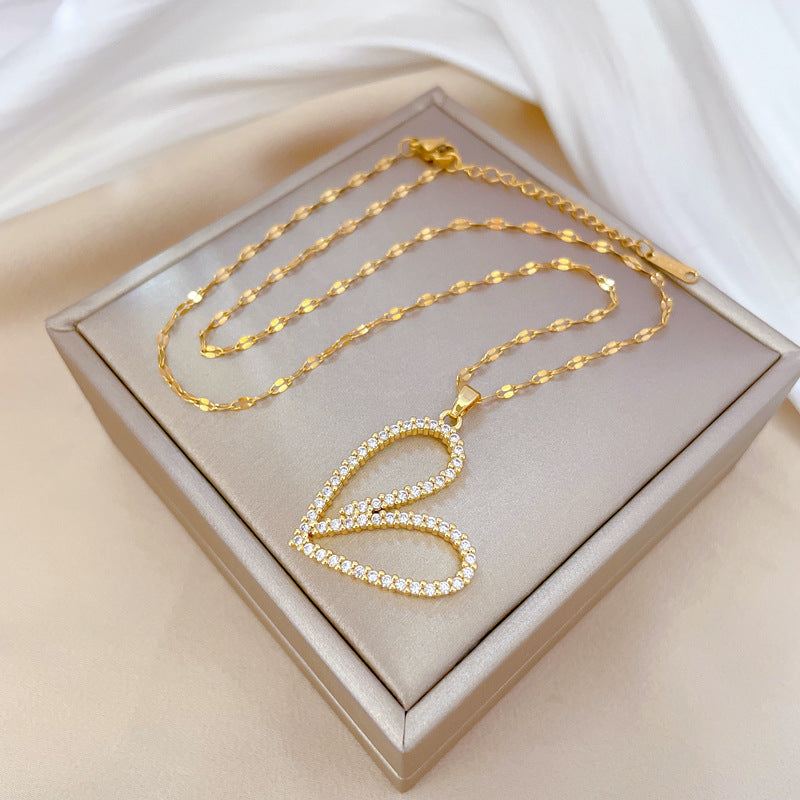 Collana con pendente a cuore geometrico di lusso per donna in acciaio al titanio con strass intarsiati, elegante catena per clavicola per matrimoni, banchetti ed eventi formali