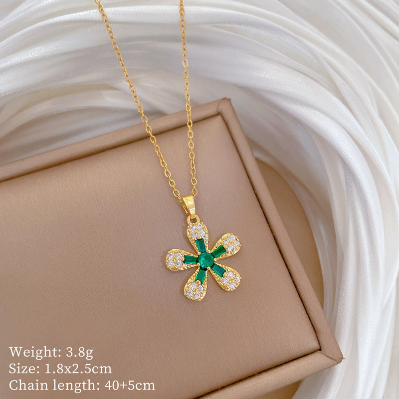Elegante collana a pendente con fiore a cinque petali per donna, con intarsio completo di strass su catena in acciaio al titanio