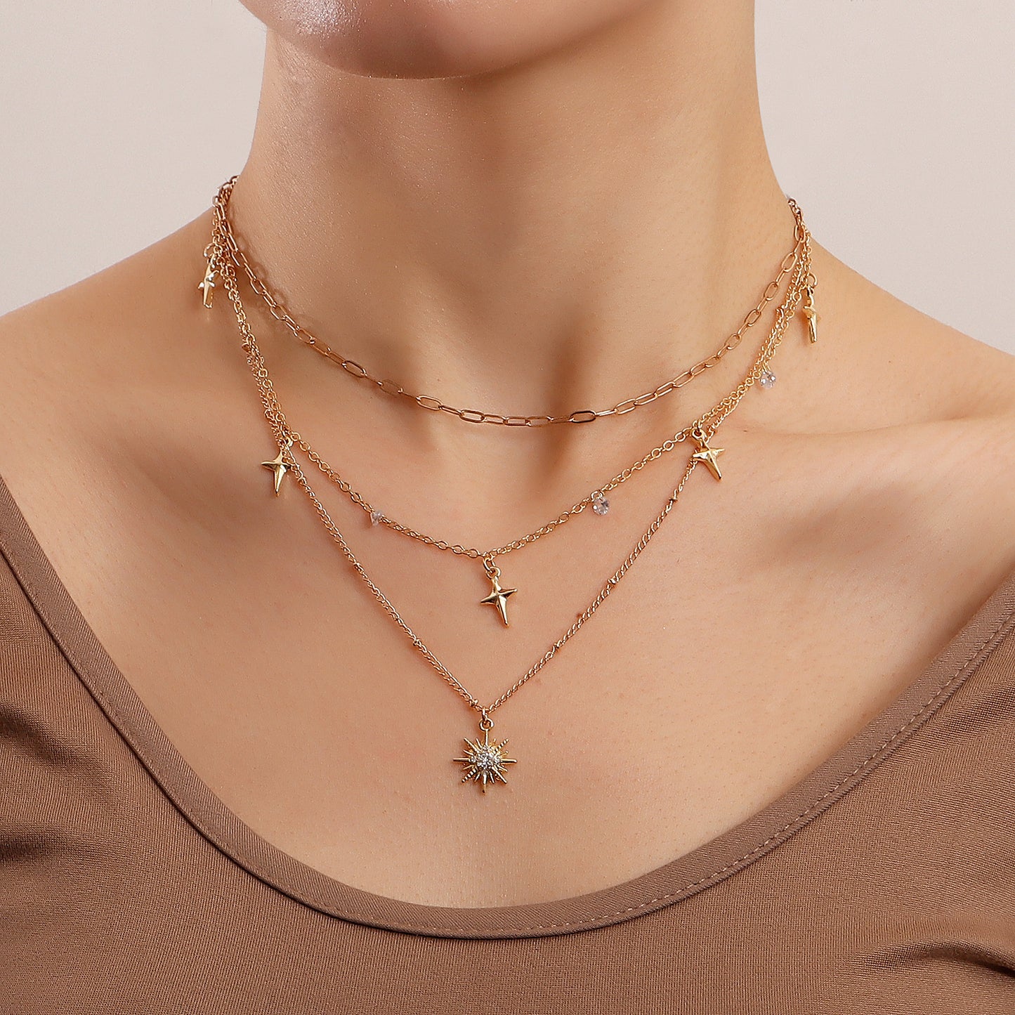 Punk Luxe Geometric Eight-Pointed Star Pendant Necklace with Rhinestone Inlay and Gold-Plated Alloy Chain