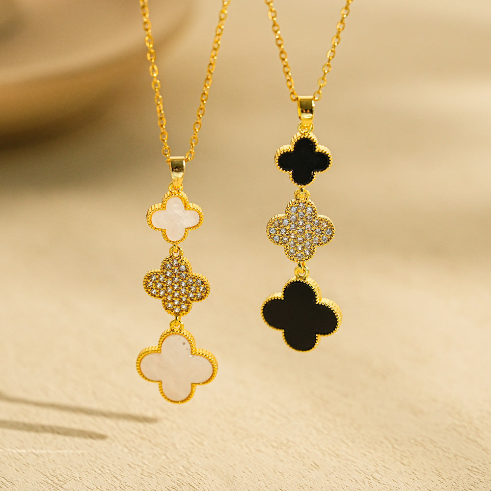 Collar minimalista con colgante de trébol de cuatro hojas en acero de titanio con chapado en oro en cadena O para mujer