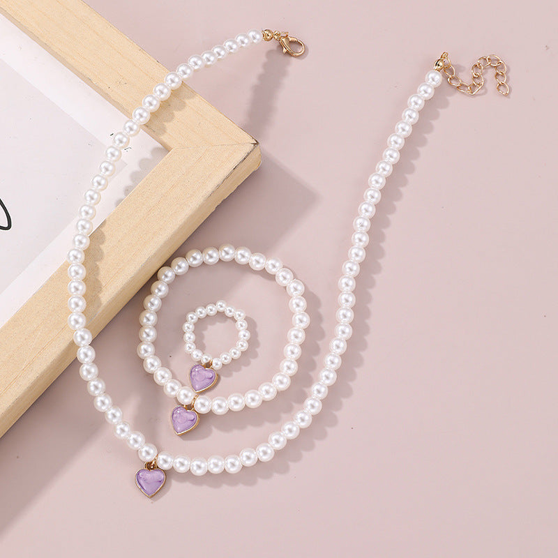 Juego de collar con colgante de aleación con forma de corazón para niñas, con cadena de perlas de agua dulce, para mayores de 6 años.