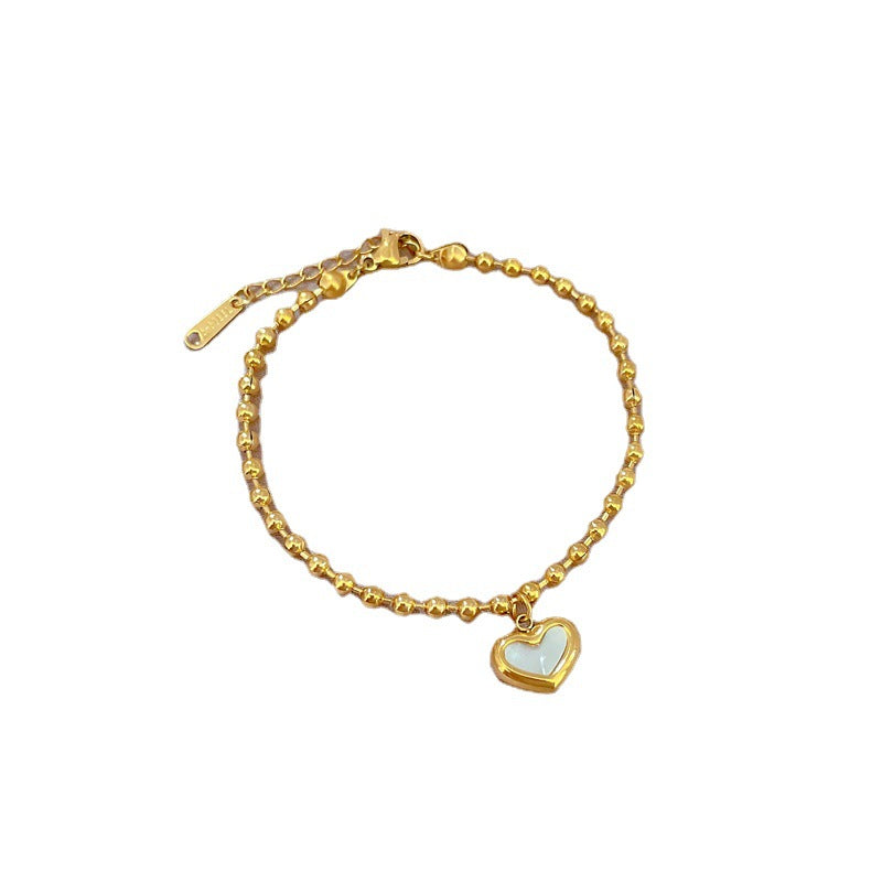 Pulsera de mano bohemia vintage de acero de titanio con corazón, cuentas redondas y ondas para mujer