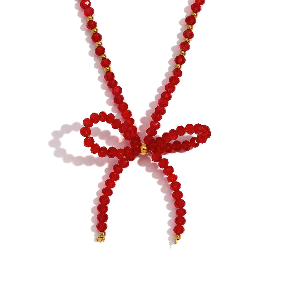 Elegante Collar de Acero Inoxidable con Forma de Lazo, Colgante de Cristal Rojo Multifacetado y Acabado Galvanizado para Mujer
