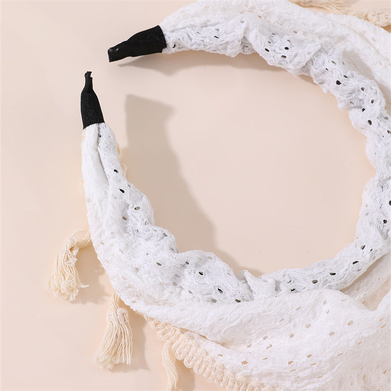 Diadema infantil con estampado floral bohemio con borlas y ribete de encaje en tela