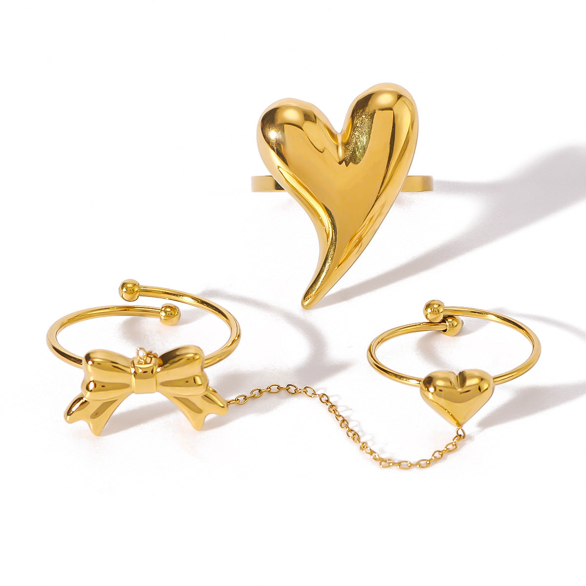 Anello minimalista a forma di fiocco e cuore in acciaio inossidabile con placcatura sottovuoto per uomo e donna